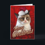 メリークリスマスの不機嫌な猫 シーズンカード<br><div class="desc">このカードはサンタ帽をかぶったグンピー猫が登場し、表に「メリークリスマス」が飾られている。</div>