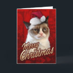 メリークリスマスの不機嫌な猫 シーズンカード<br><div class="desc">このカードはサンタ帽をかぶったグンピー猫が登場し、表に「メリークリスマス」が飾られている。</div>