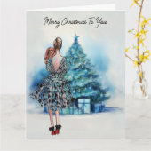 メリークリスマスの女性と青いクリスマスツリー カード (黄色い花)