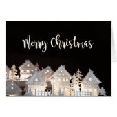 メリークリスマスの照らされたクリスマスの家 (正面横)