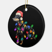 メリークリスマスの犬が光のもつれて セラミックオーナメント (左)