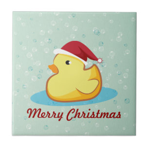 メリークリスマスの黄色のゴム製duckieのタイル タイル