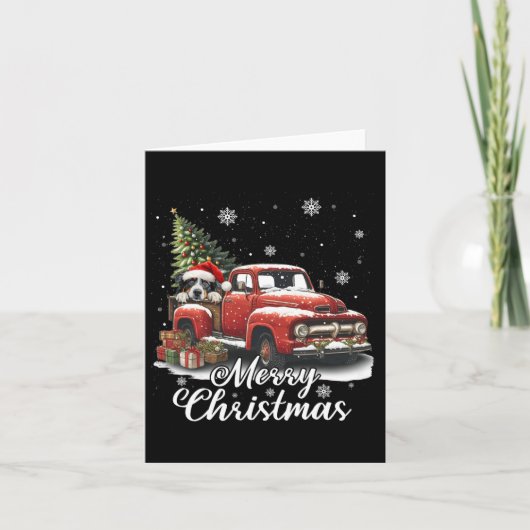 メリークリスマスオーストラリアの羊飼い犬が赤に乗る カード (正面)