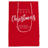 メリークリスマスキュートお洒落レッドスノーフレーク ミディアムペーパーバッグ (裏面)