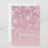 メリークリスマススノーフレーク白ピンクのグリーティング シーズンカード (正面)