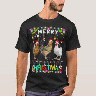 メリークリスマスチキンサンタハットライトクリスマスおもしろい Tシャツ