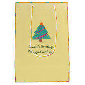 メリークリスマスドッグアイススケートで滑るカスタードイエロー ミディアムペーパーバッグ (裏面)