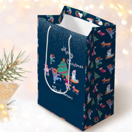 メリークリスマスドッグアイススケートで滑る冬海軍ブルー ミディアムペーパーバッグ