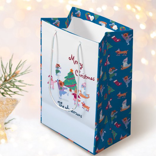 メリークリスマスドッグアイススケートで滑る名ブルー ミディアムペーパーバッグ