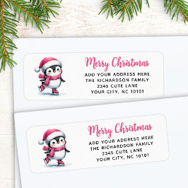 メリークリスマスピンクかわいい氷スケートで滑るペンギン ラベル