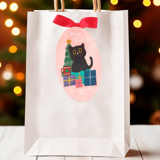 メリークリスマスピンクかわいい黒猫クリスマスツリー 楕円形シール