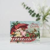 メリークリスマスヴィンテージの子ども達がサンタそりで シーズンポストカード (スタンド正面)