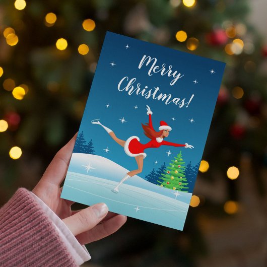 メリークリスマス姿スケートで滑るガールホリデーカード シーズンカード
