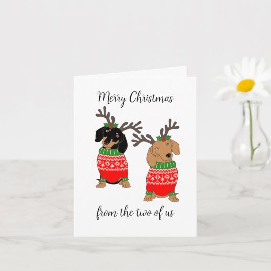 メリークリスマス2人がダックスフントを飾った カード (小さな植物)