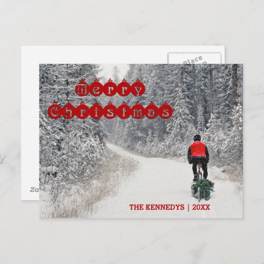 メリークリスマス – バイクもしくは自転車に乗る人が木を持ち帰る シーズンポストカード (正面/裏面)