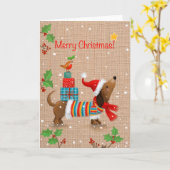 メリークリスマス、背中に贈り物を持った犬 カード (黄色い花)