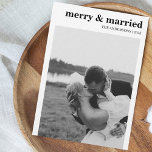 メリー&ミニマモダンリスト写真のクリスマス シーズンカード<br><div class="desc">愛と祝の最初を大切に: 'メリー & 結婚した'クリスマスカードは、初めてのクリスマスをペアとして一緒にマークするカップルのために設計された私たちの特別に細工されたクリスマスカードと一緒に楽しむことの喜び祝と'クリスマスのカード。このカードは白黒モダンのミニマルなデザインを展示し、新婚の大切な写真を展示している。ミニマモダンリズム：白黒のデザインは、気を散らさずに瞬間の美しいを強調モダンし、シンプルな感覚を醸し出す。それはあなたの愛に祝完璧なキャンバスエレガントである。A Time to 祝：カップルとしての初めてのクリスマスは結婚した、特別なマイルストーンである。このカードは、その旅の反映である。あなたが共有した愛と一緒に作成した素晴らしい瞬間を思い出させる。写真の完成：あなたの写真をカードのお気に入りの中心要素として含めることはあなたの愛の本質を捉える個人touchを追加する。それは幸福と一体感のスナップショットである。あいさパーソナライズされたい：カードの中にメッセージを追加できパーソナライズされたる。共有の愛と夢、そしてクリスマスシーズンへの興奮を満た来せん。このカードをユニークに作るチャンスだ。First of Many：このカードは1つのクリスマスのためだけのものではなく、一緒にあなたの初めてのクリスマスの記念品だ。それは愛の思い出であり、あなたの共有と、あなたが着手した旅の旅。エレガンスとメリースタイルで結婚した初めてのクリスマスをマーク。今日の特別なクリスマスカー祝ドと、お互いに発見した愛と一体感を注文しなさい。お祝前の約束と同じくらいタイムレスなカードで見つけた愛。今日クリスマスカードを注文しろ！</div>