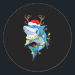 メリーSharkmas Shark with Santa Hat Christmas Ligh ラウンドシール<br><div class="desc">これはイエス素晴らし様を愛する家族や友人への贈り物だ。彼らはホリデーシーズンやその他の日に、あなたからこの贈り物を受け取ることを喜んでいる。</div>