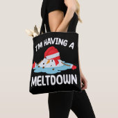 メルトダウンのクリスマス雪だるま雪を持っている トートバッグ (クローズアップ)