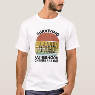 メンズ生き延びの父親の一人のビールを一度におもしろい飲む Tシャツ