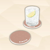 モカのムースの背景にモノグラムの白い矢印 | コースター