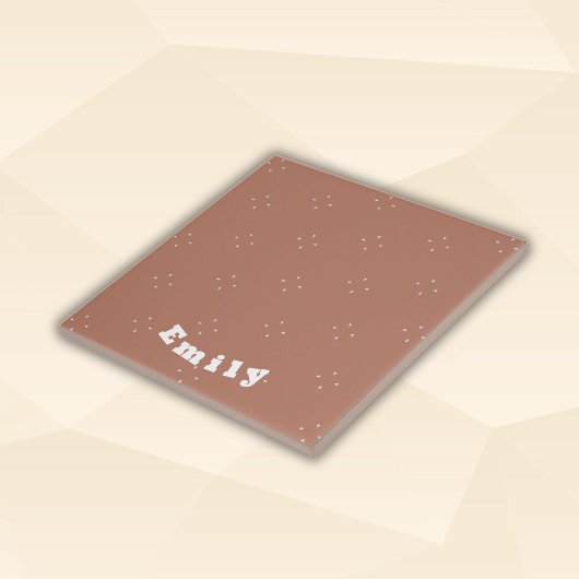 モカのムースの背景にモノグラムの白い矢印 | タイル