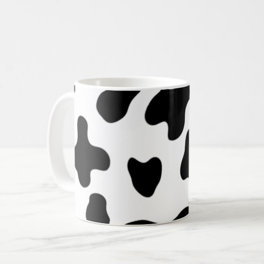 モダンでおしゃれな黒と白の牛 コーヒーマグカップ (正面左)