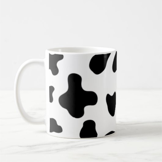 モダンでおしゃれな黒と白の牛 コーヒーマグカップ (左)