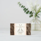 モダンでエレガントな、ラメ入りヒョウ柄のドレス 名刺 (スタンド正面)