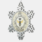 モダンなヴィンテージのフランスのな女王バチ スノーフレークピューターオーナメント (右)