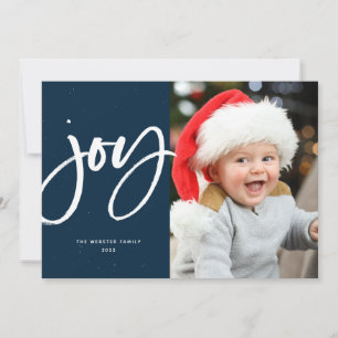 モダンな筆記体で「Joy」と書かれたネイビーのクリスマスカード シーズンカード