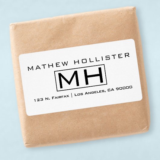 モダンな黒のテキストが白地にプロフェッショナルなモノグラム ラベル