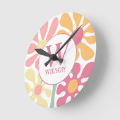 モダンカスタム家族の水彩花ピンク文字 ラウンド壁時計 (傾斜)
