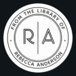 モダンミニマルMonogram The Library of Library ラウンドシール<br><div class="desc">私たちのライブラリとエレガントミニマルから"この本は属する"蔵書票で個人ライブラリを強化する。縦線で区切られたオープン型のモノグラムモダンイニシャルを備えお洒落たカスタム、この蔵書票はsans-serifのフォントにお客様の名前とパーソナライズされた文字も含まモダンれている。大切な本に洗練されたtouchを追加するのに最適な、このスタイリッシュ蔵書票デザインは、コレクションを際立たせる。本好き、コレクター、個人の図書館を大切にする人に最適。今日注文し、あなたの文学的な宝物に洗練のtouchを追加する。</div>