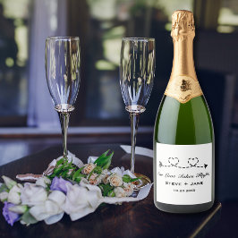 モダンロマンティックな旅の愛をテーマにした結婚式デザイン 2つのハートと矢 スパークリングワインラベル