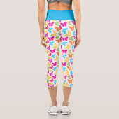モダン鮮やか蝶の虹色かわいいパターン カプリレギンス (裏面)