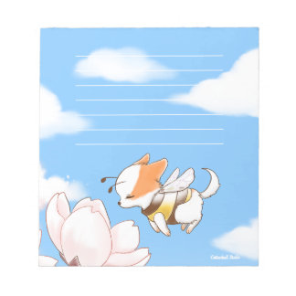 モチビーのまわりに犬の子犬と桜 ノートパッド