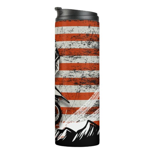 モトクロスライダーがアメリカ国旗に飛び跳ねる タンブラー (回転右)