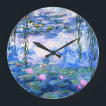 モネピンクの睡蓮 ラージ壁時計<br><div class="desc">モネピンクの睡蓮のアクリルの壁時計は、ゆりのパッドと穏やかな青い池に浮かぶ美しいピンクの睡蓮を特徴としている。印象派素晴らしと芸術のファンのためのモネの贈り物フランスの.美しい花と風光明媚な池の風景と穏やかな自然印象派。</div>