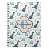 モノグラムと名前のかわいい青い緑の恐竜 ノートブック (正面)
