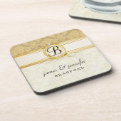 モノグラムのビクトリアンな金ゴールドのダマスク織のコルクのコースターセット コースター (左側)