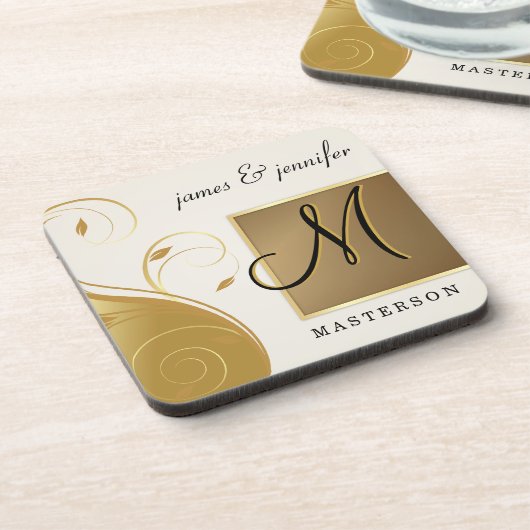 モノグラムの結婚記念日のギフトのコルクのコースターセット コースター (左側)