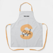 モノグラムはっきりしたオレンジ大文字イニシャルスクリプト名 エプロン (正面)