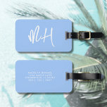 モノグラムミニマルスクリプトパステルブルーバケーション ラゲッジタグ<br><div class="desc">季節のポップ・アートのスタイルを私たちの荷物のタグでパーソナライズされたあなたの冒険に追加 – 新鮮な、春と夏のパステルインスパイアブルーで利用可能に。台本エレガントイニシャルを前面に搭載したラベルは、実用的なデザインと魅力を組み合わせていモダンる。裏面には、旅行中に連絡お客様の名前と情報が、迅速な識別と安心を実現するために読、鮮明で簡単間のフォントで表示される。シックで旅行のアクセサリーを愛する男性と女性の両方のために設計さモノグラムのれ、これらのラベルは、任意のスーツケース、バックパック、またはweekenderバッグにパーソナリティのtouchをもたらす。あなたはのビーチ休暇のために噴出し、山を介して道路をトリップ、または日当たりの良い都市の脱出を楽しむかどうか、私たちの荷物タグはあなたの春や夏の休暇ギアに機能追加スタイリッシュ。あなたの旅の必需品は、荷物の回転木馬の群衆の中に立っている間、あなたの旅行を風に整理する完璧な贈り物や治療に最適である。</div>