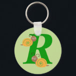 モノグラム文字R brian the snail kids keychain キーホルダー<br><div class="desc">モノグラムイニシャルレターR brianカタツムリの漫画の子供や子供のキーチェーン/キーリング。女の子と男の子のための理想的な贈り物またはプレゼント</div>