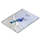 モノグラム水色冬の雪の鳥の青いジェイ ノートブック (左側)