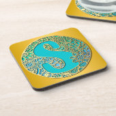 モノグラム金ゴールドとターコイズSとカラフル花 コースター (左側)