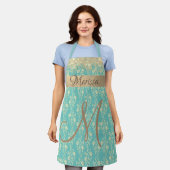 モノグラム金ゴールドフローラオングリーンティール（緑がかった色） エプロン (着用した状態)