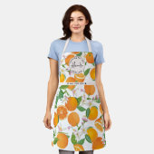 モマ最高のー名オレンジ柑橘系パターン水色 エプロン (着用した状態)