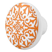 モロッコのタイル-珊瑚のオレンジおよび白い セラミックノブ (右)